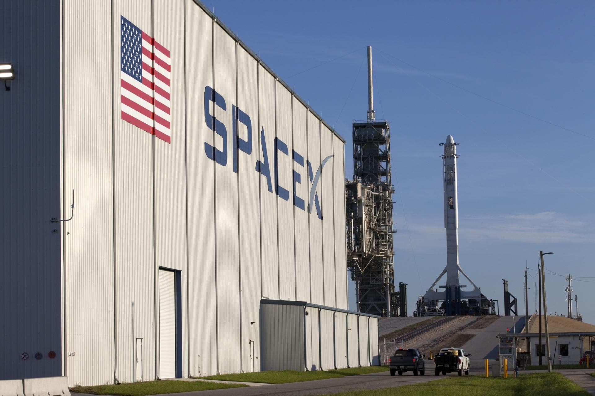 As a Falcon 9 rocket stands ready for liftoff at the Kennedy Space Center's Launch Complex 39A. The rocket will boost a Dragon resupply spacecraft to the International Space Station. Liftoff is schedu