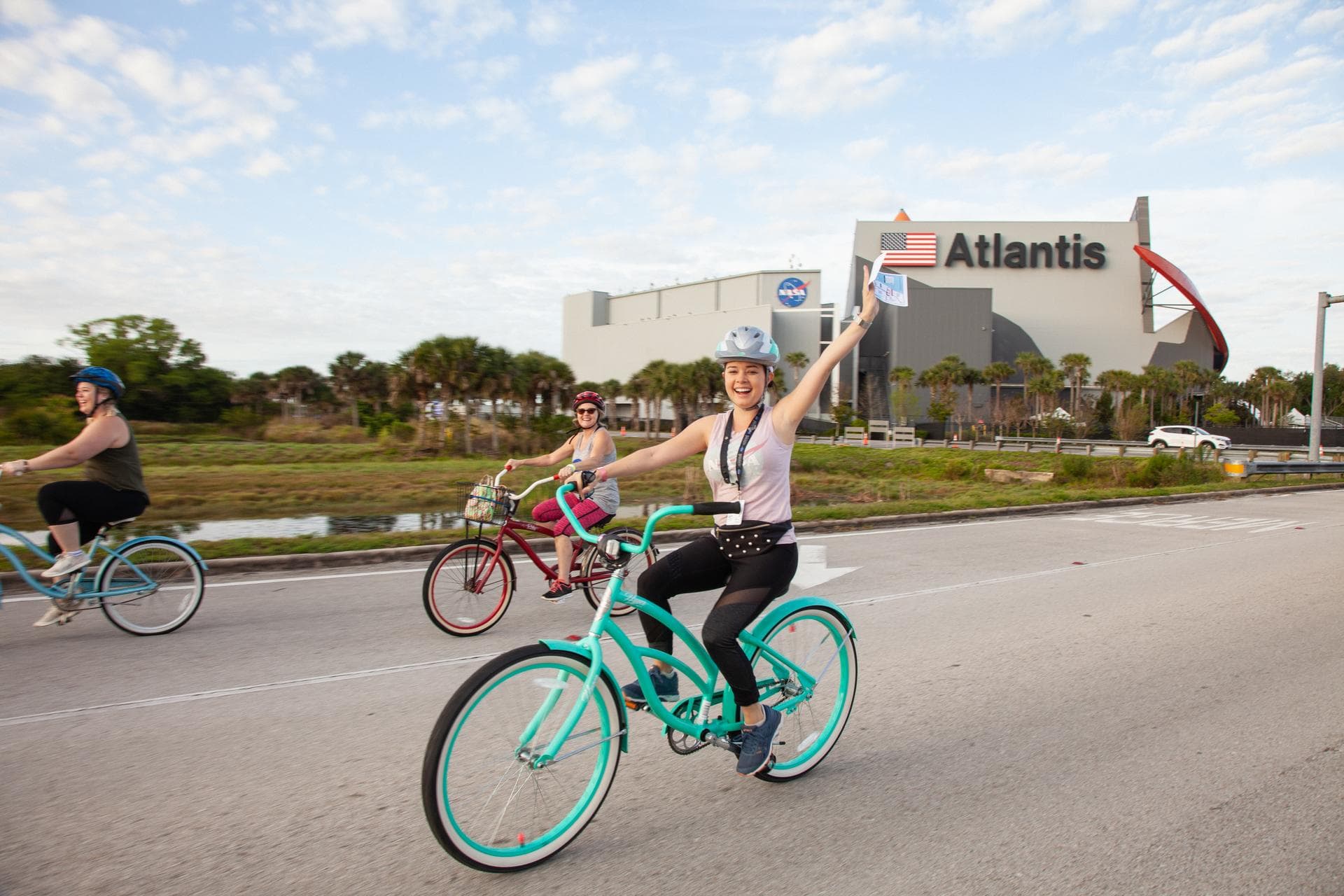Cyclists ride away from the Kennedy Space Center Visitor Complex, the starting point of the center’s annual Tour de KSC. The bicycle tour took place March 30, giving Kennedy employees and guests the o