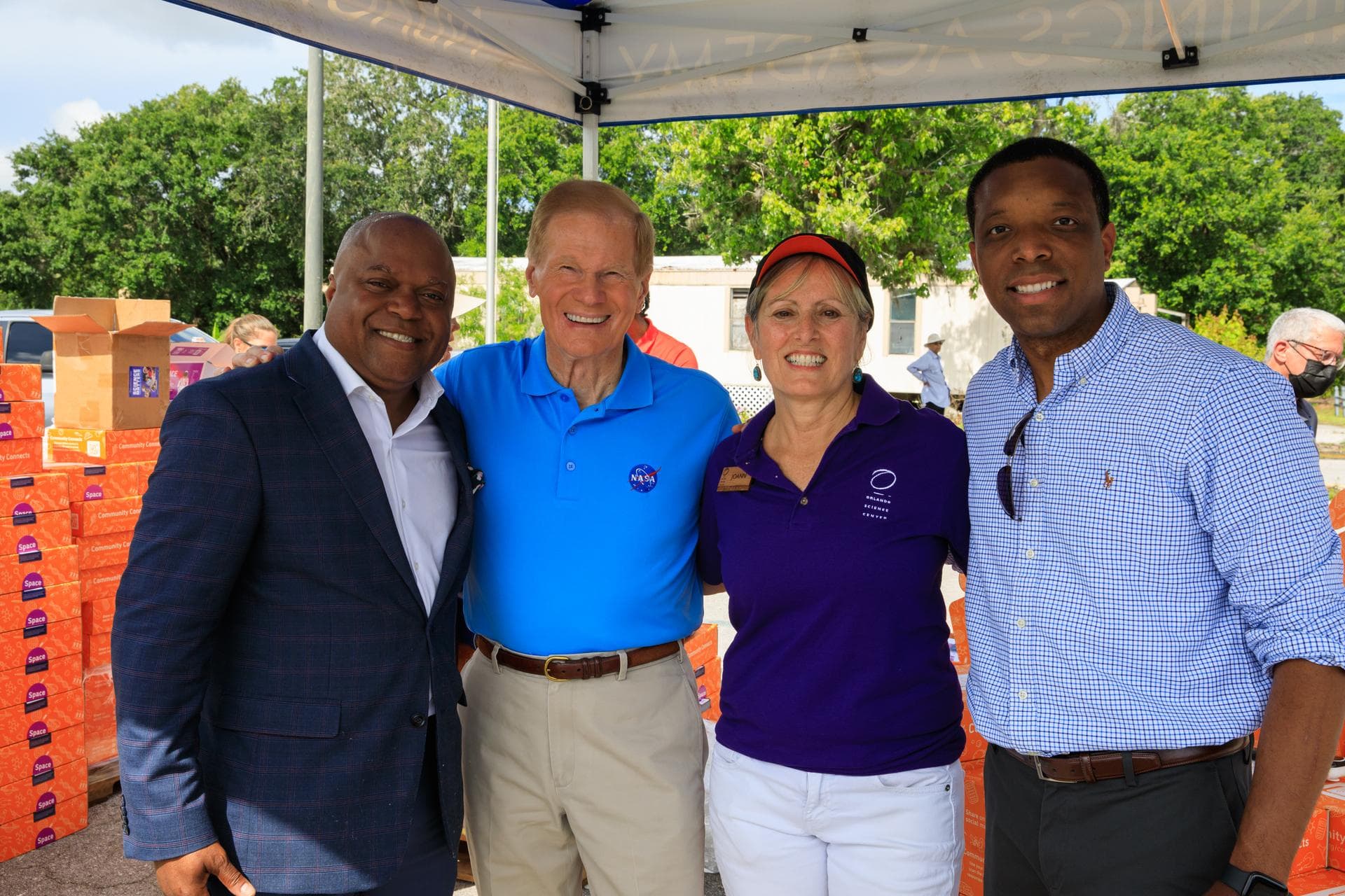 From left to right, Dr. Frederic Bertley, president and CEO, Center of Science and Industry (COSI); NASA Administrator Bill Nelson; JoAnn Newman, president and CEO, Orlando Science Center; and Stephen