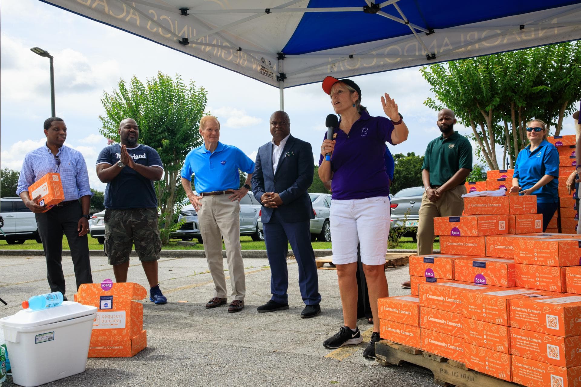 Dr. Frederic Bertley (center), president and CEO, Center of Science and Industry (COSI), speaks at New Beginnings Church – The Gathering Place in Orlando, Florida on Friday, June 3, as part of the lau