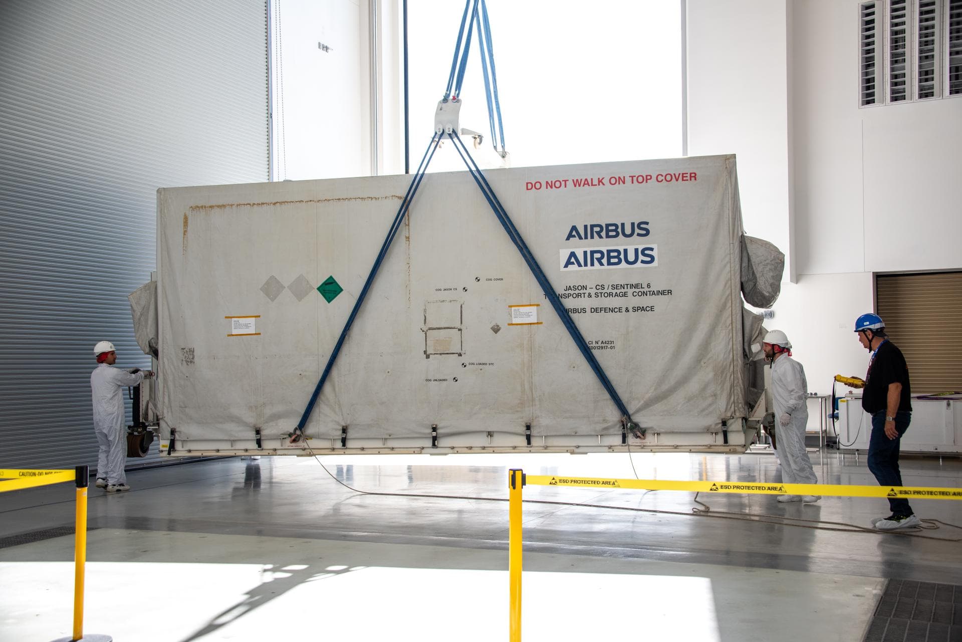 Technicians transfer the Sentinel-6B spacecraft from the NASA hangar to the Astrotech Space Operations payload processing facility at Vandenberg Space Force Base in California on Wednesday, Sept. 24,