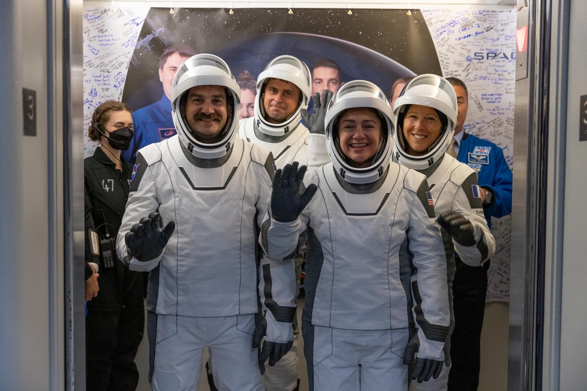 NASA’s SpaceX Crew-12 crew members board an elevator during walk out of the Neil A. Armstrong Operations and Checkout Building at the agency’s Kennedy Space Center in Florida for nearby Space Launch C