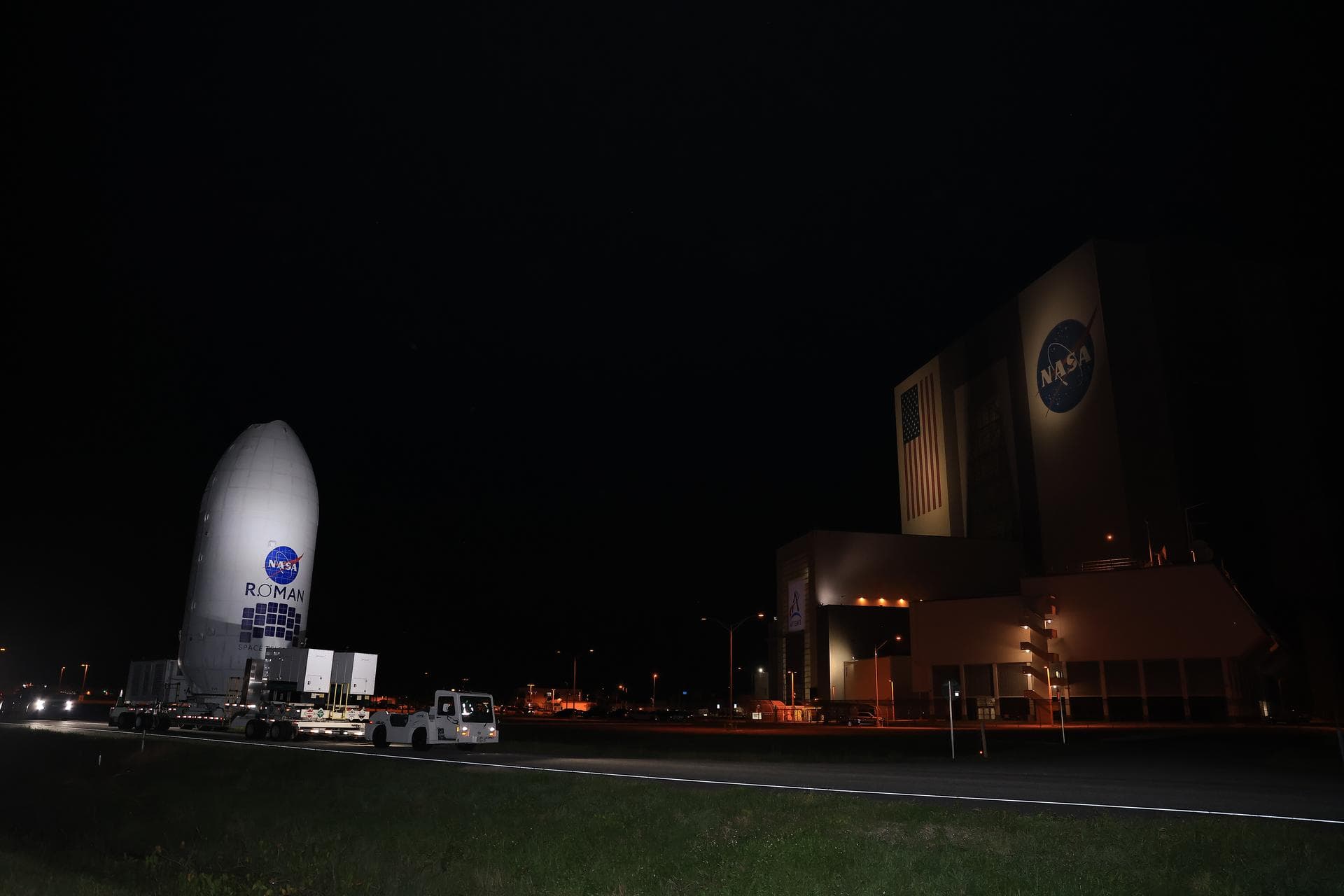NASA’s Nancy Grace Roman Space Telescope, encapsulated in its payload fairing, travels from the Payload Hazardous Servicing Facility to the SpaceX hangar at Launch Complex 39A at NASA’s Kennedy Space