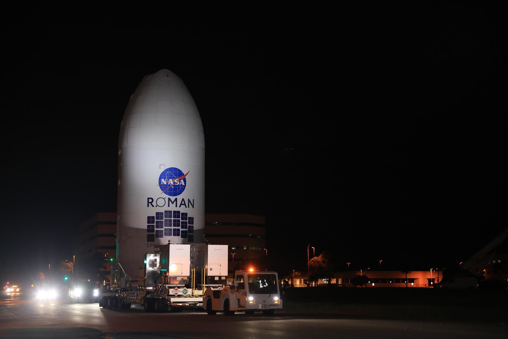 NASA’s Nancy Grace Roman Space Telescope, encapsulated in its payload fairing, travels from the Payload Hazardous Servicing Facility to the SpaceX hangar at Launch Complex 39A at NASA’s Kennedy Space