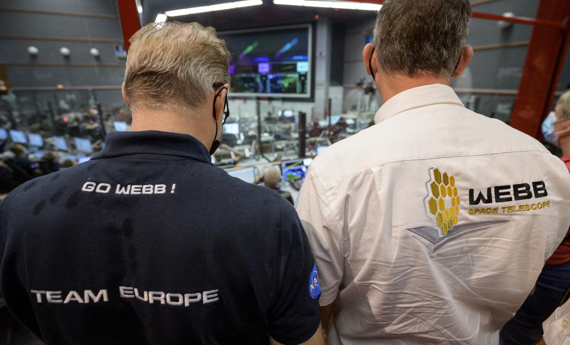 ESA (European Space Agency) Director-General Dr. Josef Aschbacher, left, and NASA Associate Administrator for the Science Mission Directorate Thomas Zurbuchen, monitor the progress of the Ariane 5 roc