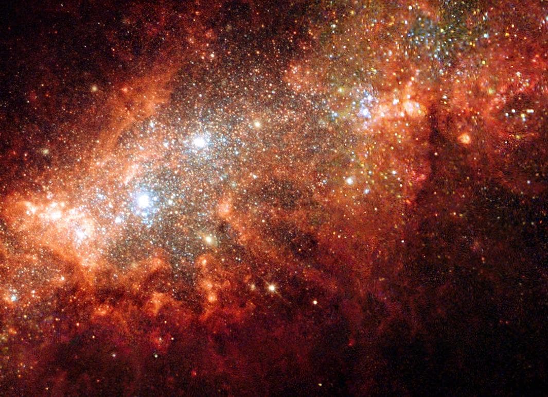 The nearby dwarf galaxy NGC 1569 is a hotbed of vigorous star birth activity, which blows huge bubbles that riddle the galaxy main body. The image was taken by the WPF2 camera, designed and built by J