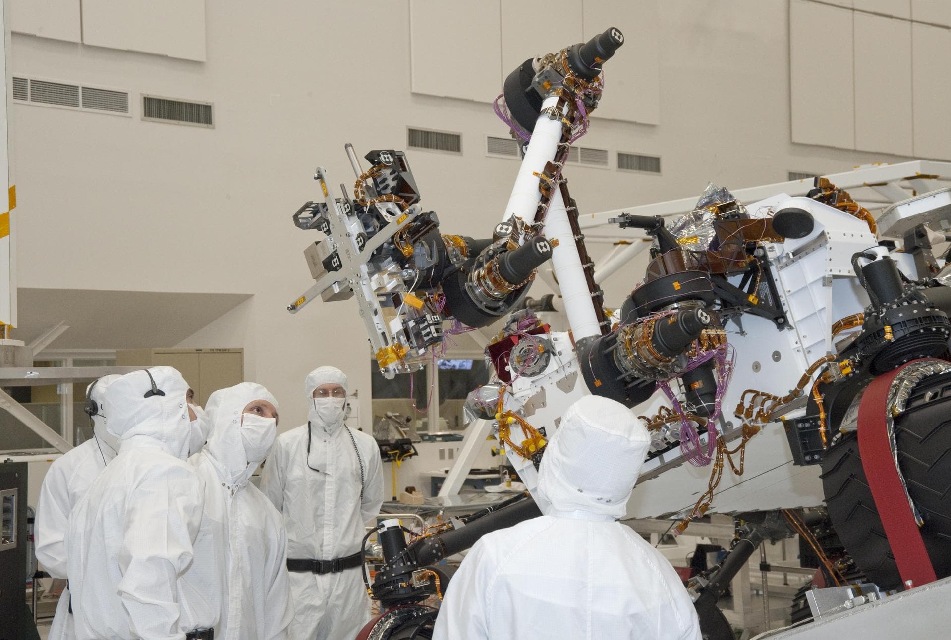 Testing of the robotic arm on NASA Mars rover Curiosity on Sept. 3, 2010, included movements of the arm while the rover was on a table tilted to 20 degrees to simulate a sloped surface on Mars.