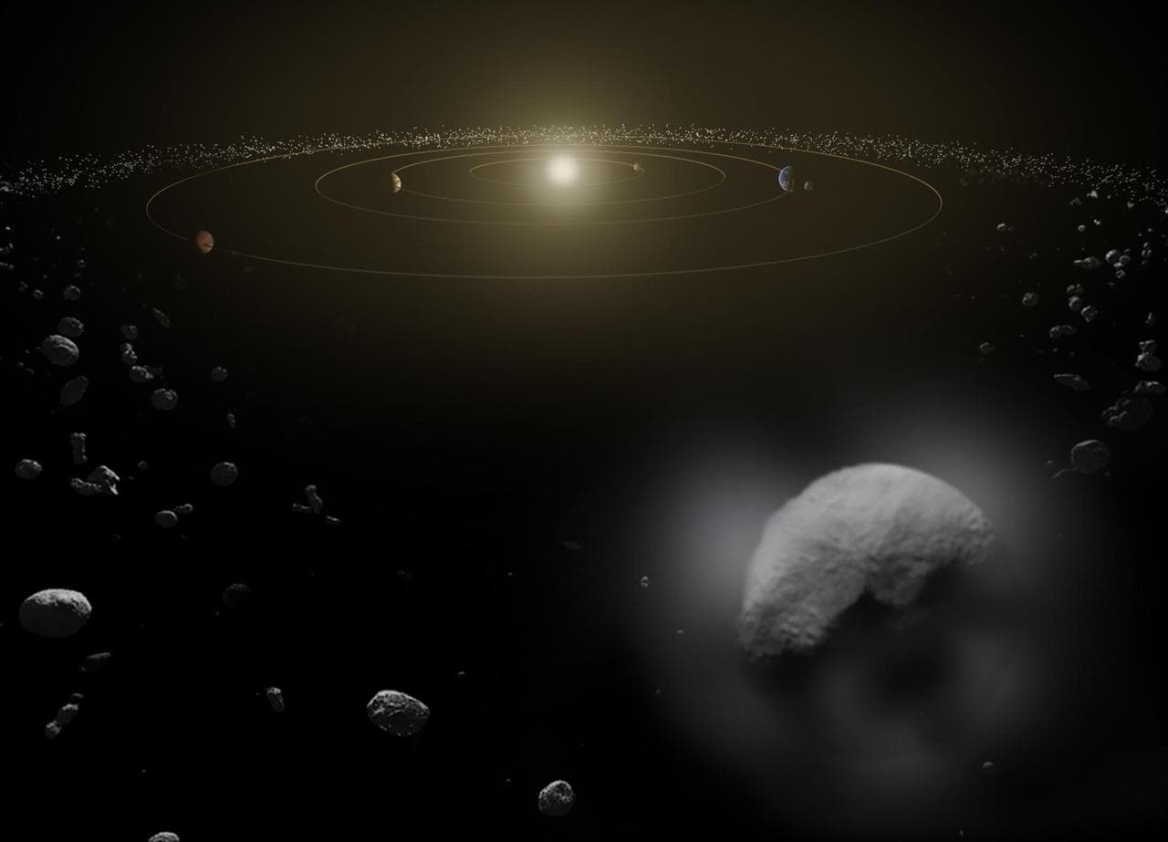 Dwarf planet Ceres is located in the main asteroid belt, between the orbits of Mars and Jupiter, as illustrated in this artist conception.