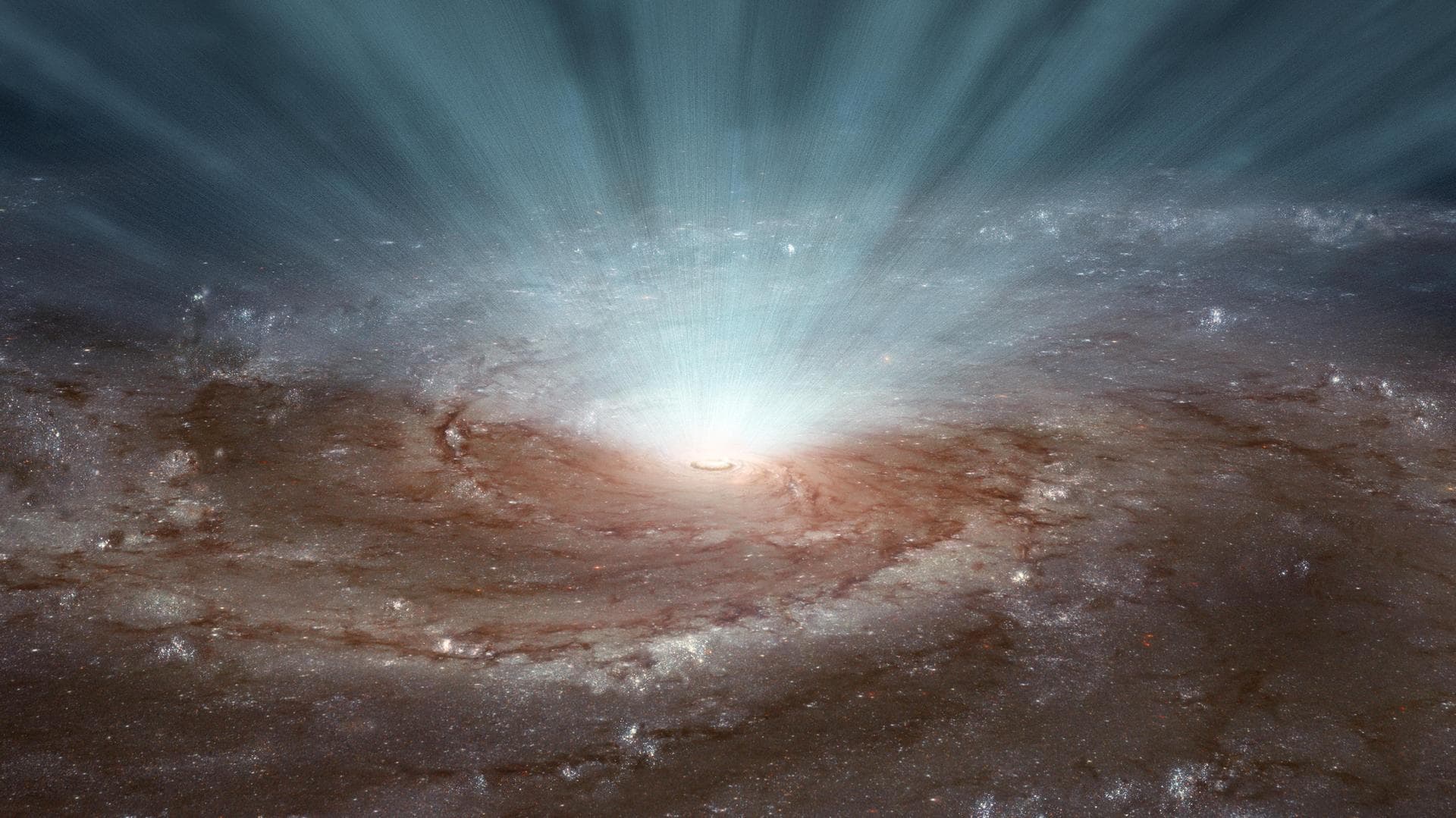 Supermassive black holes at the cores of galaxies blast radiation and ultra-fast winds outward, as illustrated in this artist conception based on NASA NuSTAR and ESA XMM-Newton telescopes.