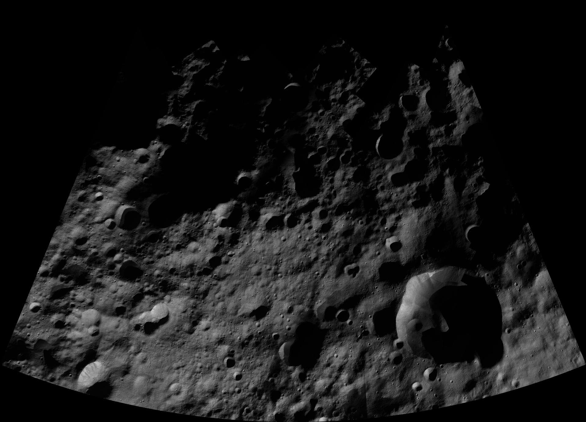 This image from the atlas of the giant asteroid Vesta was created from images taken as NASA's Dawn mission flew around the object, also known as a protoplanet. The set of maps was created from mosaics