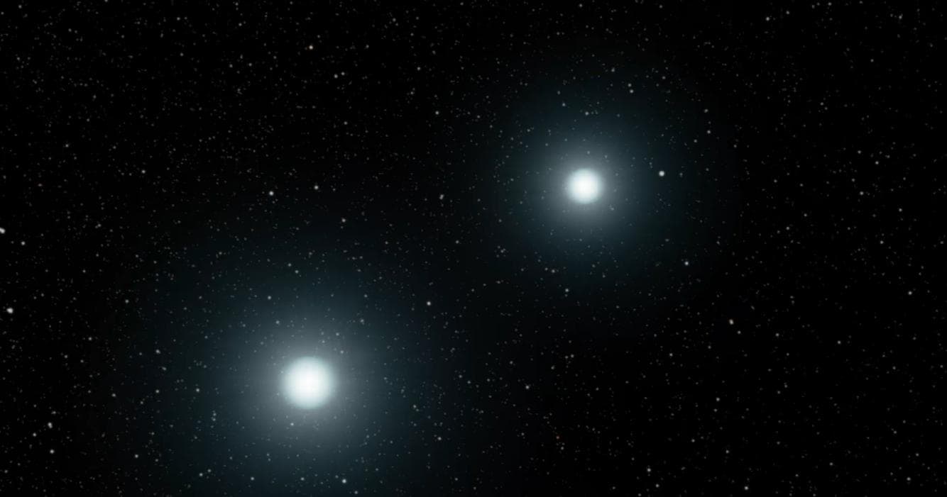 This frame from an animation shows the merger of two white dwarfs. A white dwarf is an extremely dense remnant of a star that can no longer burn nuclear fuel at its core. This is another way that a "t