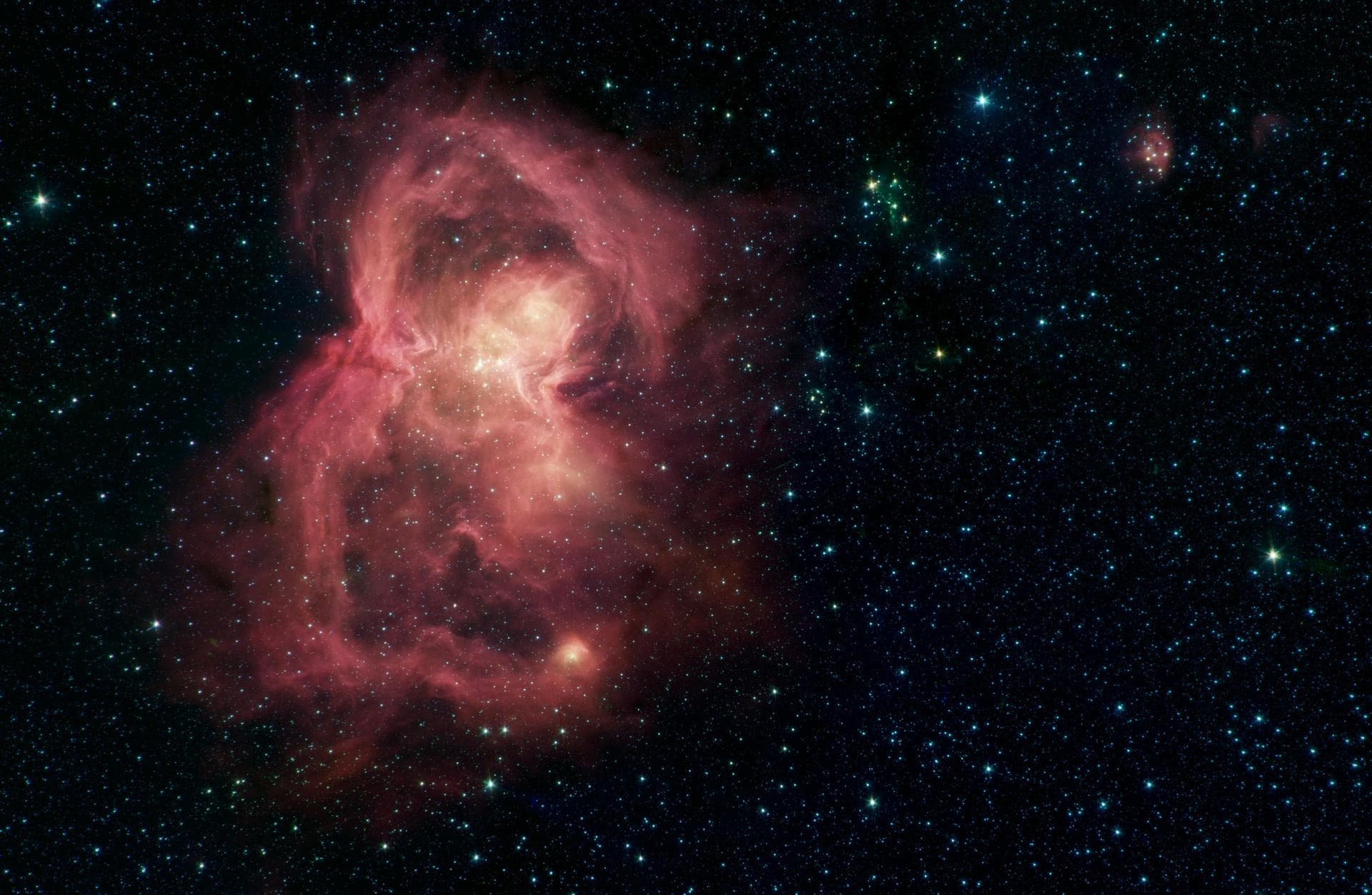 What looks like a red butterfly in space is in reality a nursery for hundreds of baby stars, revealed in this infrared image from NASA's Spitzer Space Telescope. Officially named W40, the butterfly is