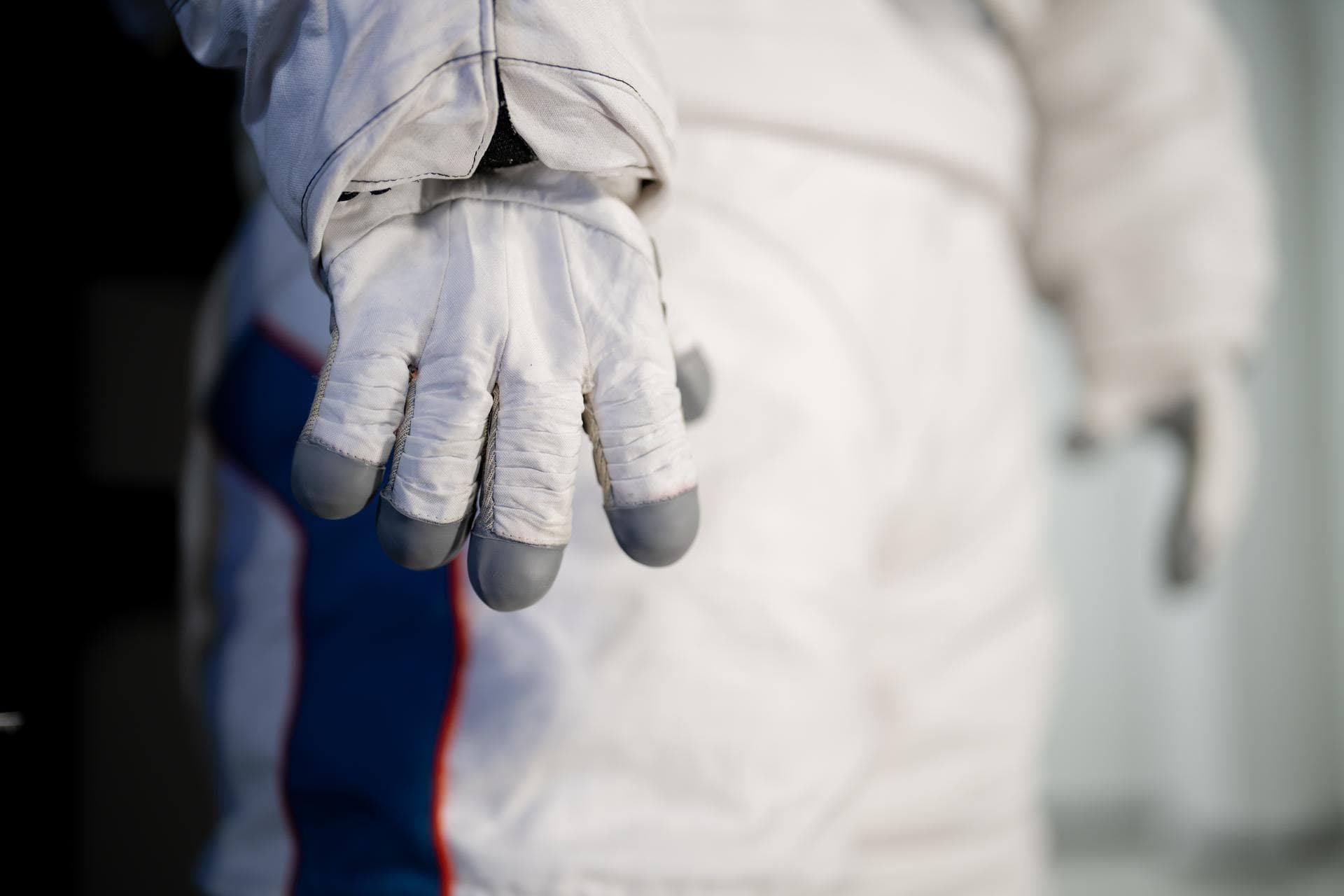 An up close image of a glove on Axiom Space's AxEMU (Axiom Extravehicular Mobility Unit) lunar spacesuit. Image Credit: Axiom Space