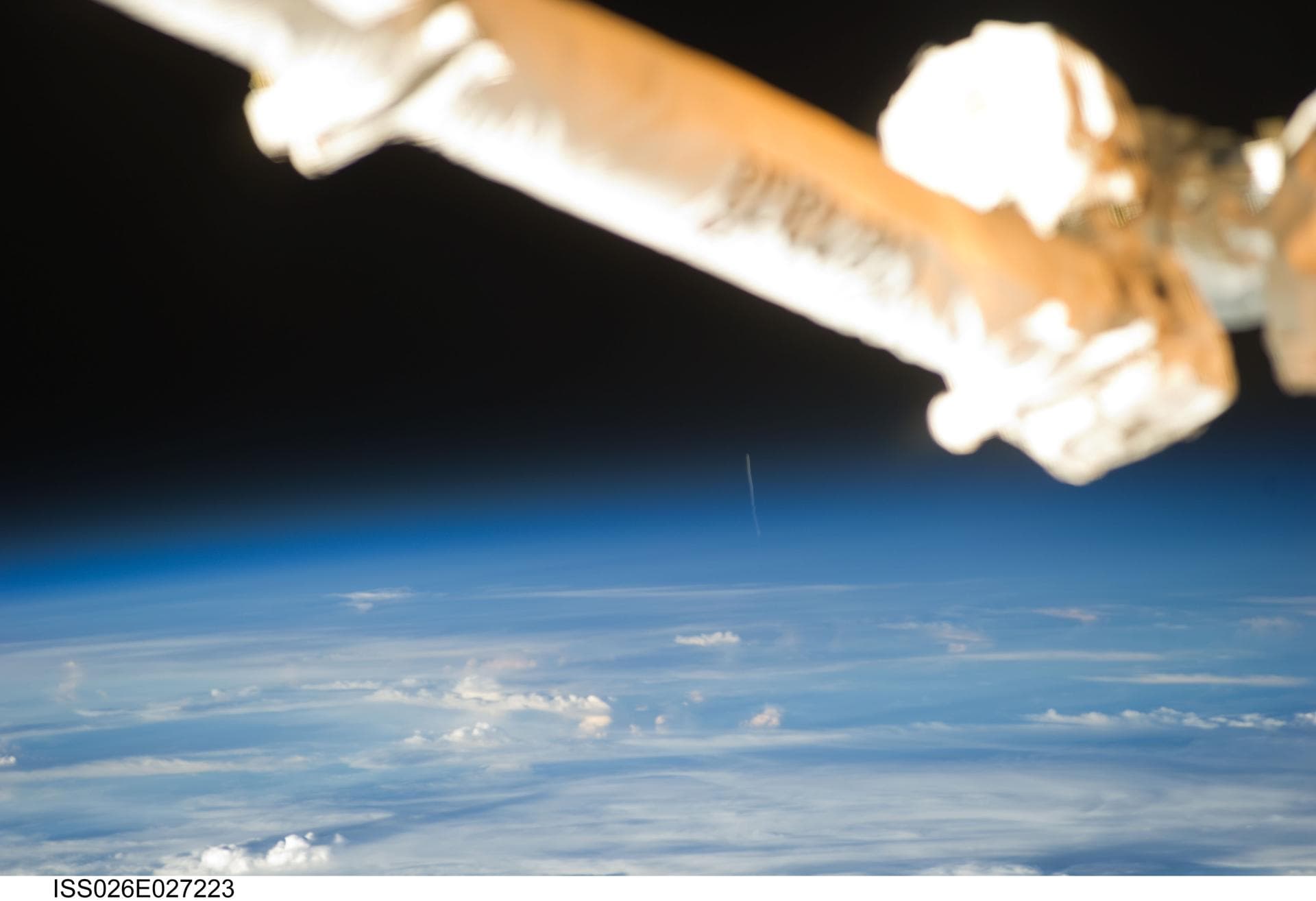 ISS026-E-027323 (16 Feb. 2011) --- The Expedition 26 crew member aboard the International Space Station who snapped this photograph of the Ariane 5 rocket, barely visible in the far background, just a