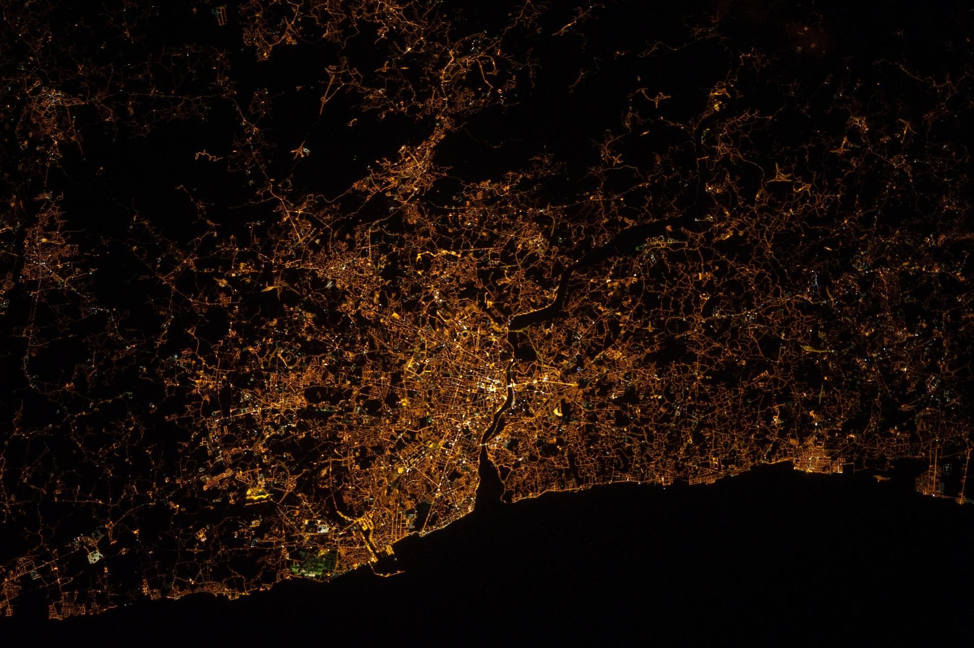 ISS032-E-015055 (5 Aug. 2012) --- One of the Expedition 32 crew members aboard the International Space Station recorded this nighttime image of Portugal featuring Porto (left) and Vila Nova de Gaia (r