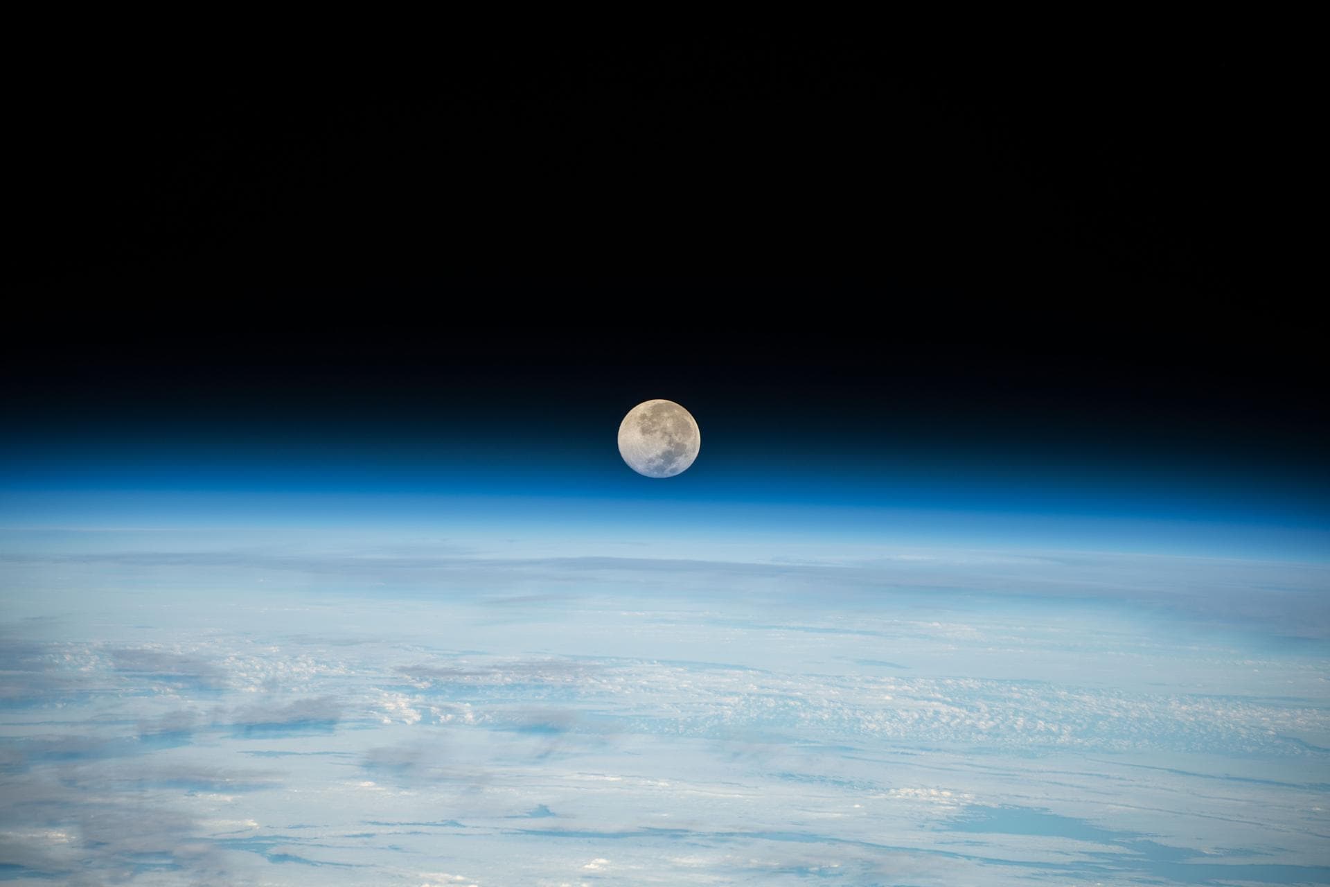 iss068e027836 (Dec. 8, 2022) --- The Full Moon is pictured setting below Earth's horizon from the International Space Station as it orbited 262 miles above the Pacific Ocean. At the time of this photo