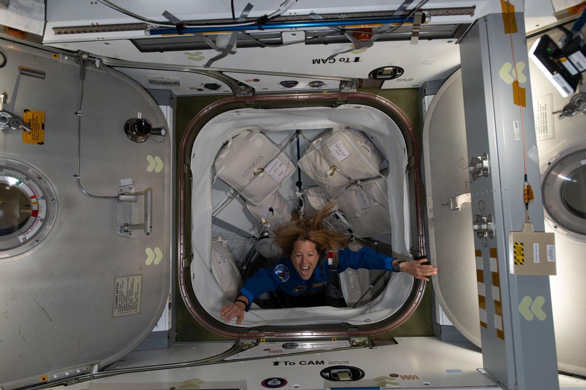 iss074e0314129 (Feb. 14, 2026) --- ESA (European Space Agency) astronaut and SpaceX Crew-12 Mission Specialist Sophie Adenot enters the International Space Station after docking aboard the Dragon spac