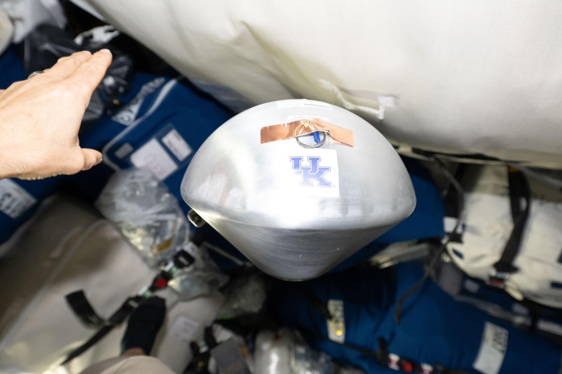 iss075e0185943 (Oct. 7, 2026) --- A KREPE-3 capsule floats inside the Northrup Grumman Cygnus XL 24 cargo spacecraft. Inside the capsule is a 3-D printed heat shield designed by researchers at NASA’s