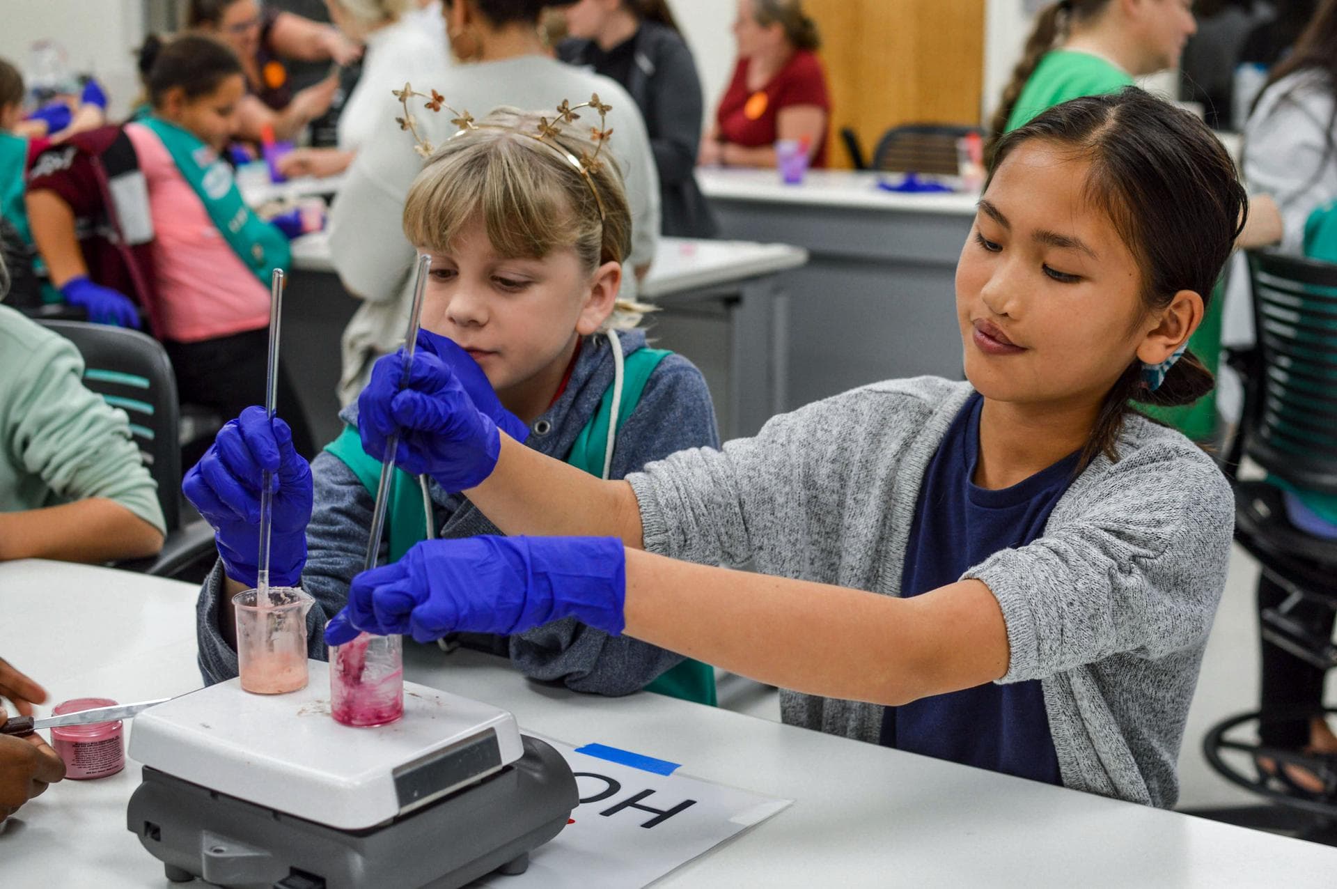 jsc2021e037279 (11/15/2019) --- Girl Scouts prepare experiments as part of a STEM collaboration with the Girl Scouts of Citrus Council. Faraday-Girl Scouts-1 (Faraday-Girls Scouts) offers Girl Scouts