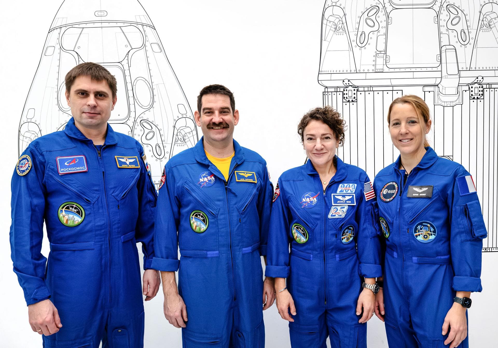 jsc2026e004029 (Jan. 23, 2026) --- The four members of NASA's SpaceX Crew-12 mission to the International Space Station pose together for a crew portrait in their blue flight suits at SpaceX headquart